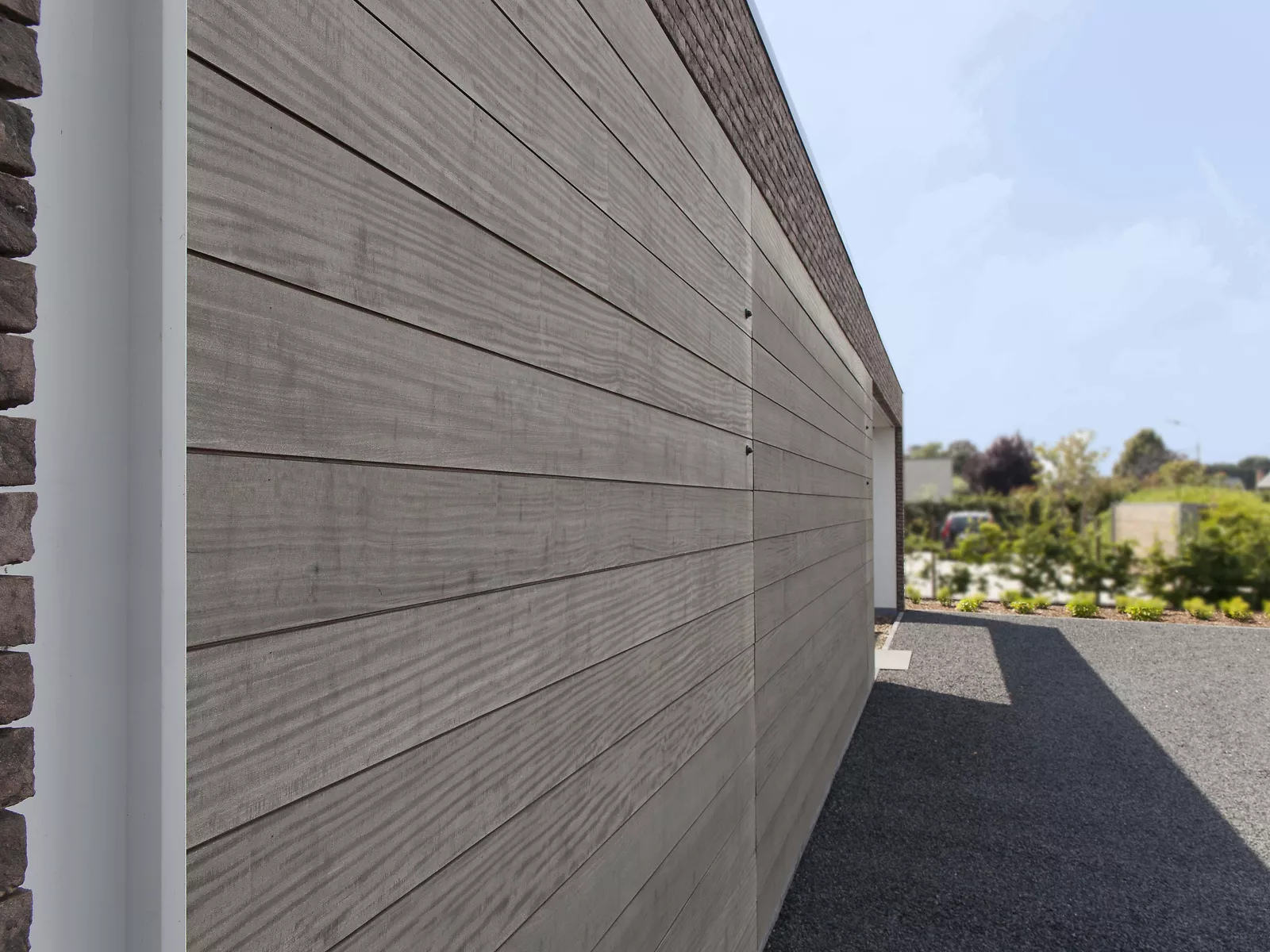 Houten garagepoort in afrormosia