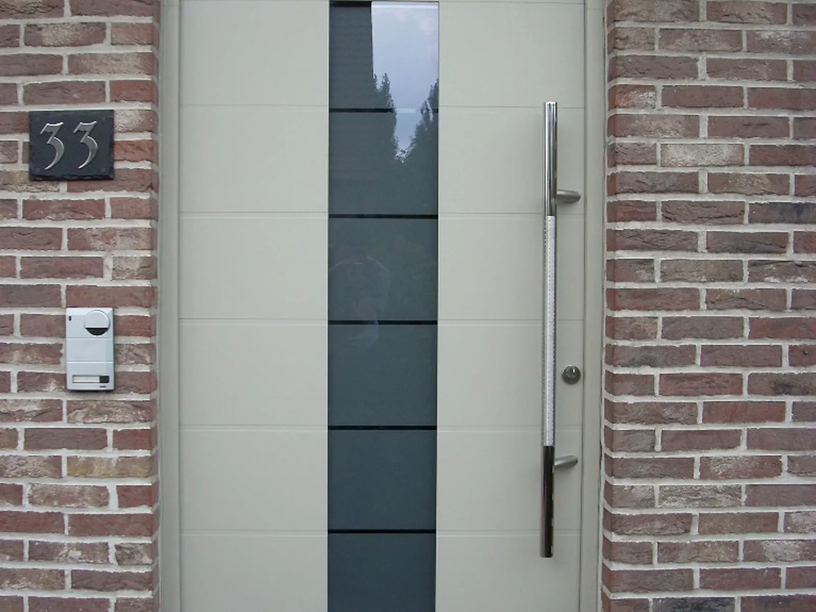 Vervangen van ronde voordeur te Waregem