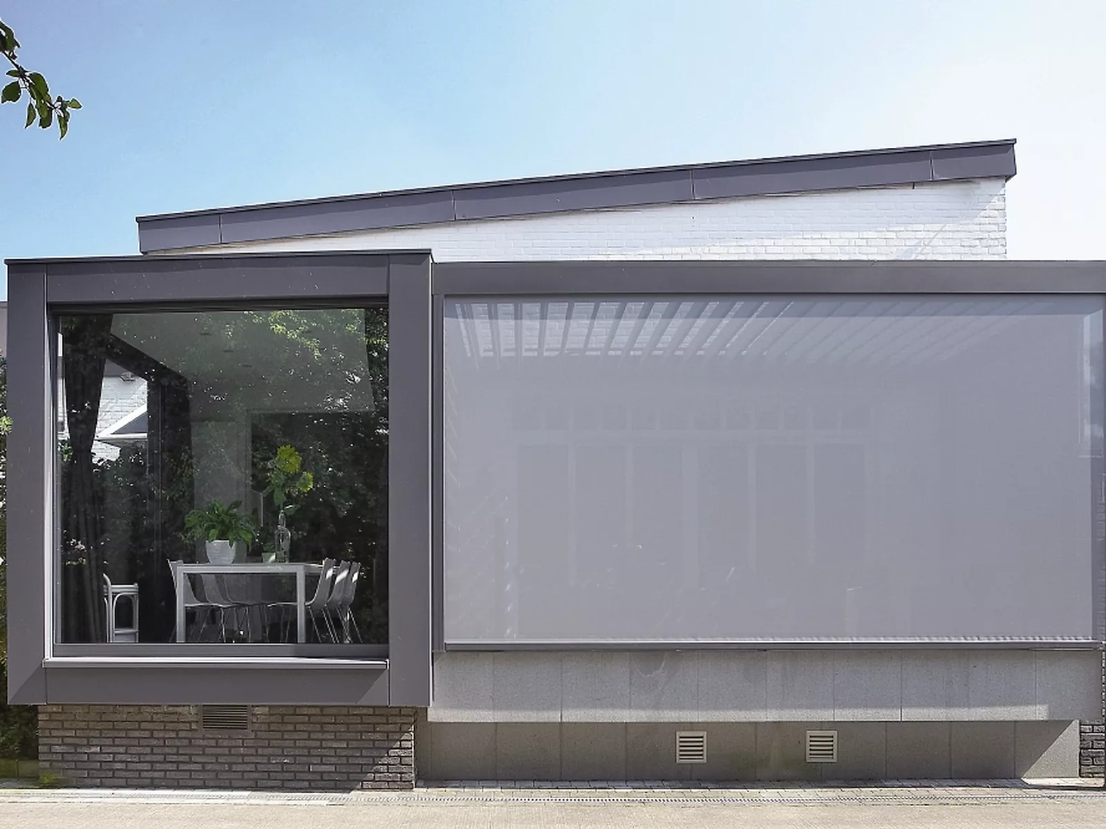 Aangebouwde terrasoverkapping in Merelbeke