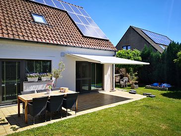 Knikarmschermen aan klassieke woningen