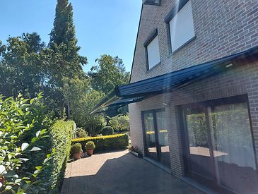 Knikarmschermen aan klassieke woningen