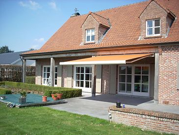 Knikarmschermen aan klassieke woningen