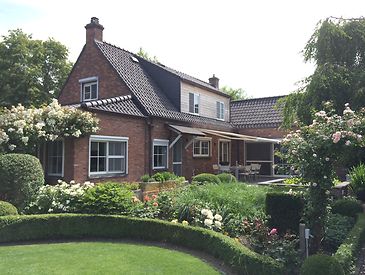 Knikarmschermen aan klassieke woningen
