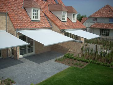 Knikarmschermen aan klassieke woningen