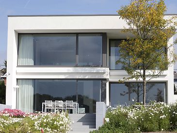 Knikarmschermen aan moderne woningen
