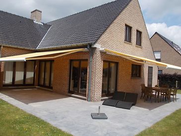 Knikarmschermen aan klassieke woningen