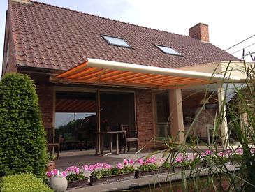 Knikarmschermen aan klassieke woningen